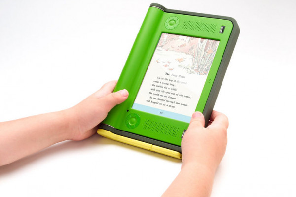 A user viewing an electronic page on an eBook-reading device - a $100 Laptop prototype