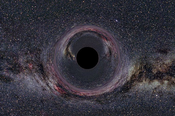 A simulated Black Hole of ten solar masses as seen from a distance of 600km with the Milky Way in the background (horizontal camera opening angle: 90°)