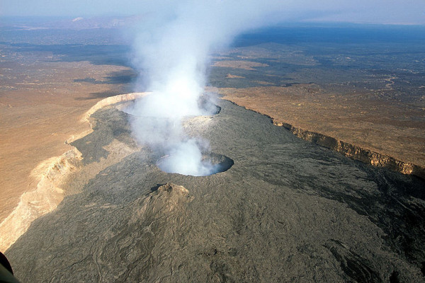 Erta Ale is an active shield volcano located in the Afar Region of northeastern Ethiopia. It is the most active volcano in Ethiopia. Erta Ale stands 613 metres tall, with a lava lake, one of only four in the world, at the summit.