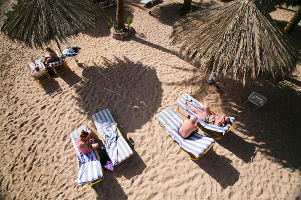 Sunbathing in Naama Bay, Sharm el-Sheikh, Egypt.
