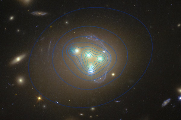 The galaxy cluster Abell 3827. The distribution of dark matter is shown with blue lines.
