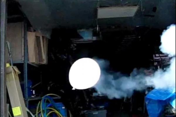 Balloon trailing smoke