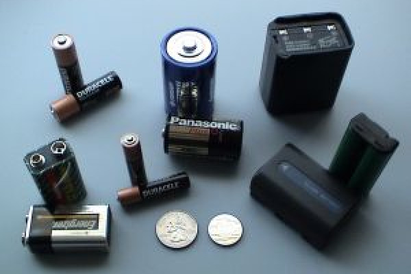 Various batteries: two 9-volt, two \AAA\, two \AA\, and one each of \C\, \D\, a cordless phone battery, a camcorder battery, a 2-meter handheld ham radio battery, and a button battery.