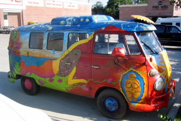 A VW Combi decorated by hippies.