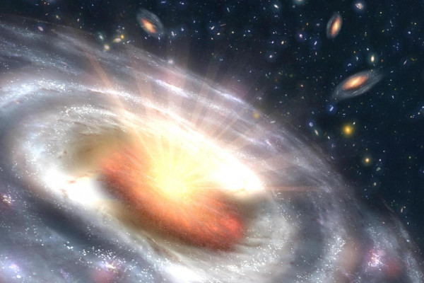 A growing black hole, called a quasar, can be seen at the center of a faraway galaxy in this artist's concept.