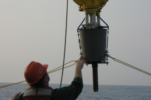 Hauling a DOV back on deck, with buoyancy control in the yellow housing, and sampling equipment underneath.