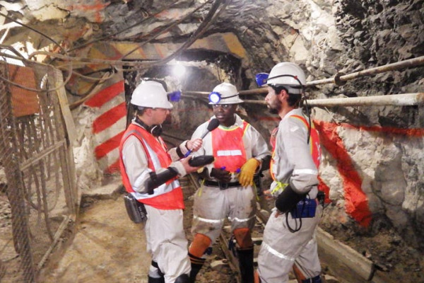 University of the Free State scientists Kay Kuloyo and Borja Linage with Chris Smith in the Sibanye Gold Dreifontein gold mine, South Africa.