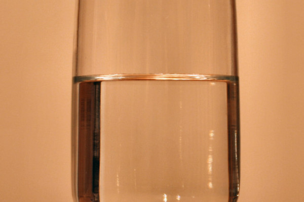 A glass of water, demonstrating the eternal conundrum of whether the glass is half full or half empty.