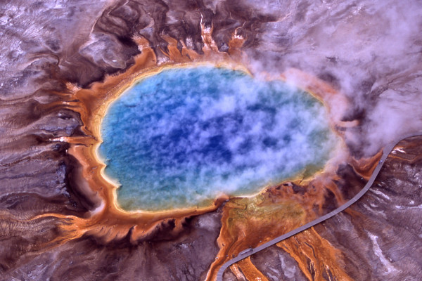 Aerial view of Grand Prismatic Spring; Hot Springs, Midway & Lower Geyser Basin, Yellowstone National Park. The spring is approximately 250 by 300 feet (75 by 91 m) in size.