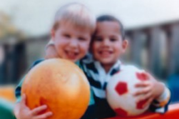 Human eyesight - two children and ball with myopia short-sightedness