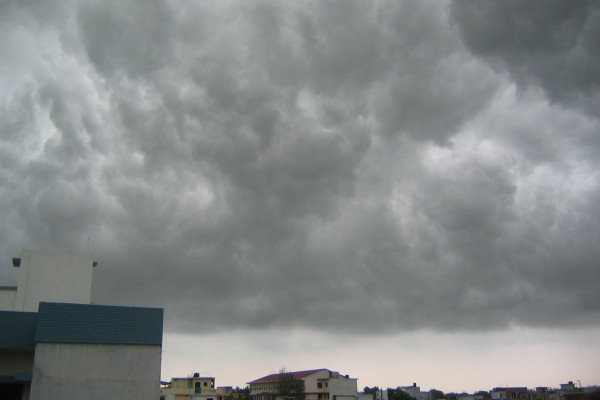 A photo of dark stormy monsoon clouds over the city of Lucknow,India.