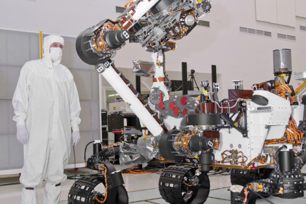  The turret at the end of Curiosity's robotic arm holds five devices. On the left (downhill) edge of the turret in this view is the percussive drill for collecting powdered samples from rock interiors. On the edge toward the camera is a brush device...