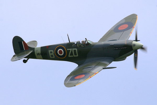 Spitfire LF Mk IX, MH434, flown by Ray Hanna in 2005. This aircraft shot down a Fw 190 in 1943 while serving with 222 Squadron RAF.