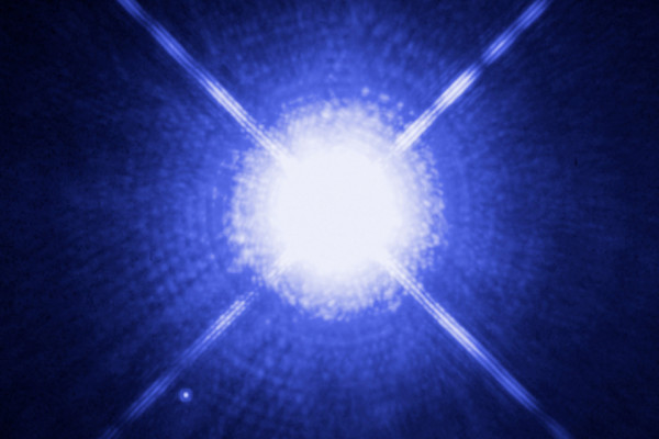  This Hubble Space Telescope image shows Sirius A, the brightest star in our nighttime sky, along with its faint, tiny stellar companion, Sirius B. Astronomers overexposed the image of Sirius A [at centre] so that the dim Sirius B [tiny dot at lower...