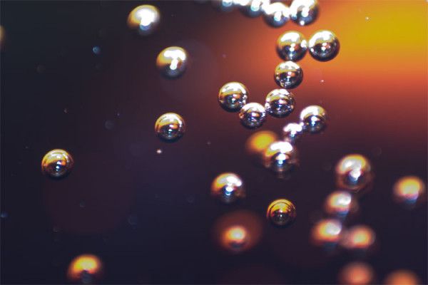 Macro photograph of bubbles in a fizzy drink