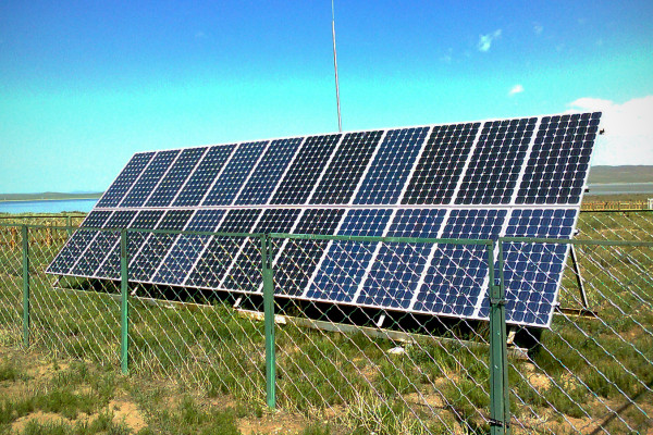 Solar panel installation at an information center adjacent to Ögii Lake