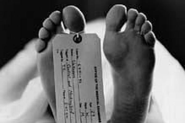 A toe tag is put on a toe of a dead body for identification reasons in morgues