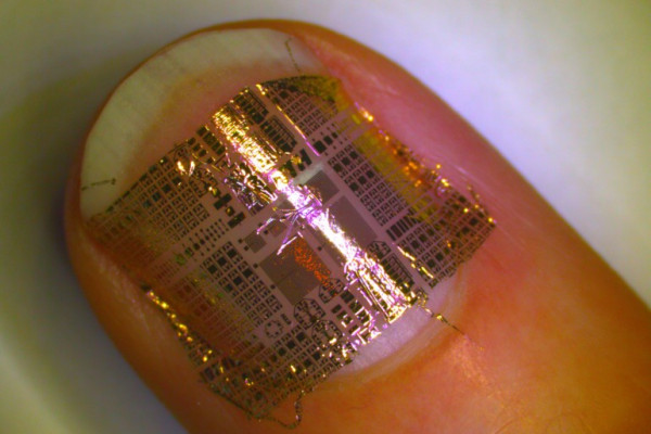 Wafer-thin electronics that can be wrapped around a human hair or even implanted into a contact lens for medical monitoring