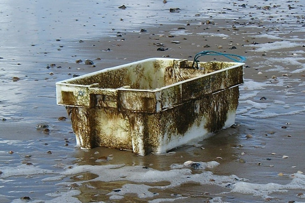 A plastic box washed up on a beach