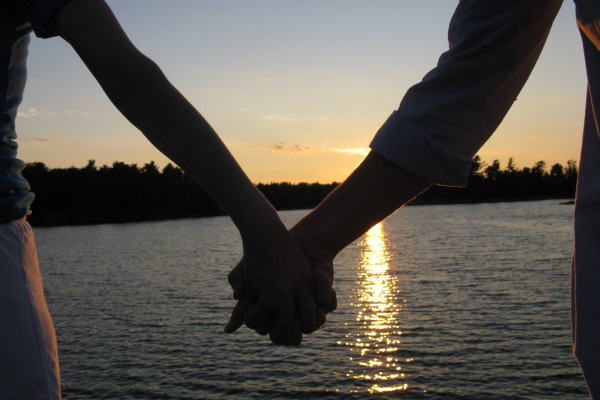 A couple holding hands