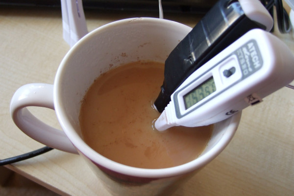 Measuring the temperature both with a normal thermometer and one connected to a computer.
