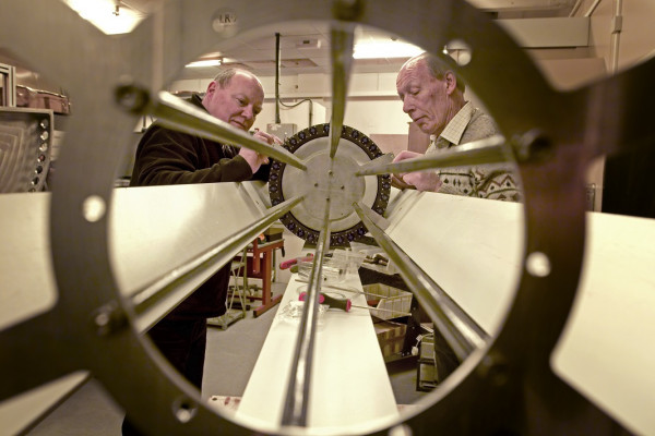 Scientists working on some apparatus for the muon ionisation cooling experiment.