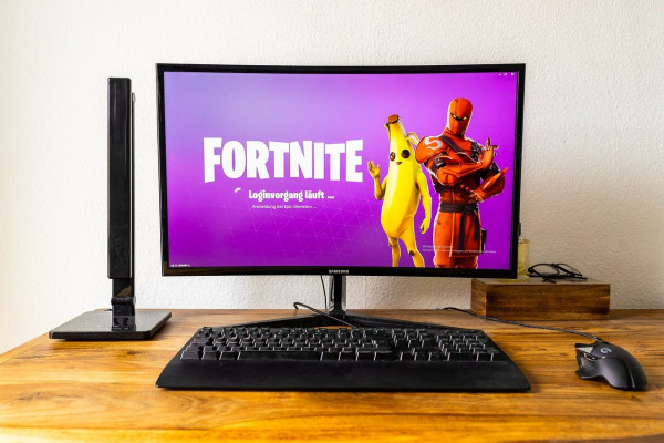 A computer with Fortnite on the screen