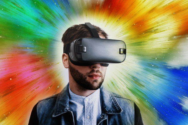 A gamer wearing a virtual reality headset.