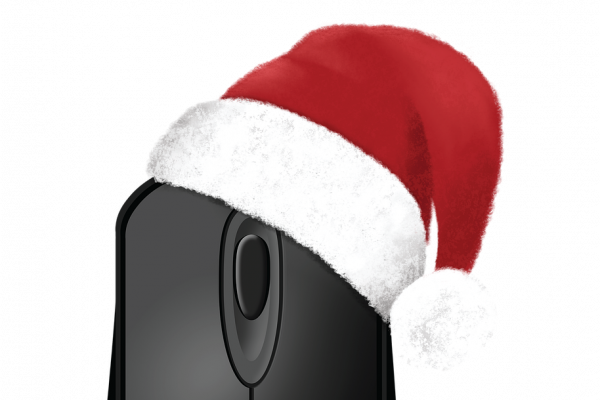 A computer mouse with a santa hat on