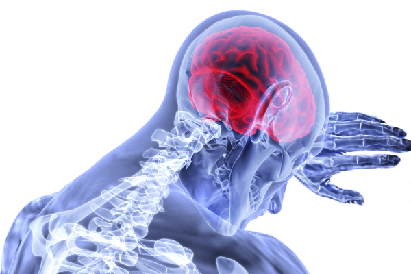 A X-ray image of figure clutching their head, with their brain glowing in red.
