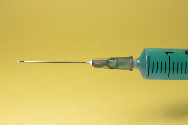 The tip of a syringe.