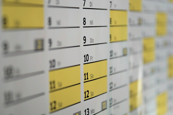 A close up of a wall calendar