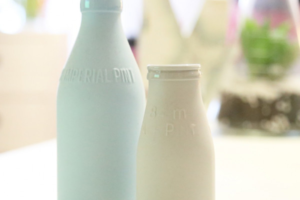 Two dairy bottles.