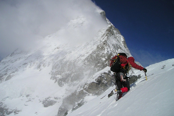 Someone climbing the Matterhorn.