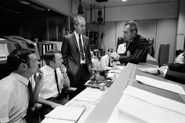 Shift 2 flight director Gerry Griffin (second from left) during the Apollo 13 mission in NASA’s Mission Operations Control Room, 1970.