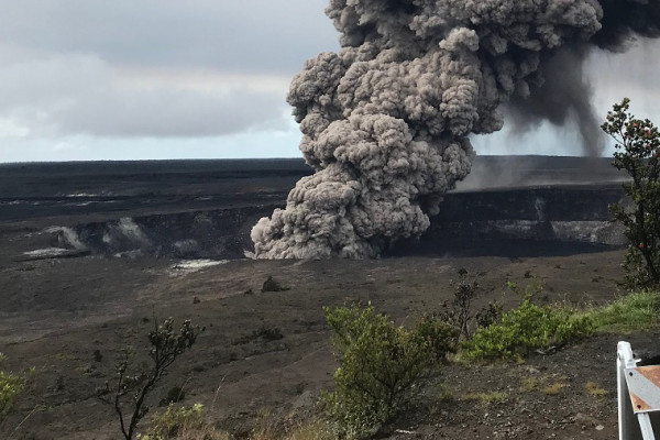 Ash column rises from the Overlook crater at the summit of Kīlauea Volcano. HVO's interpretation is that the explosion was triggered by a rockfall from the steep walls of Overlook crater. The photograph was taken at 8:29 a.m. HST on the 10th May from the 