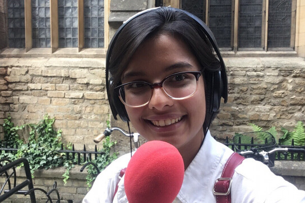 Ankita holding a mic