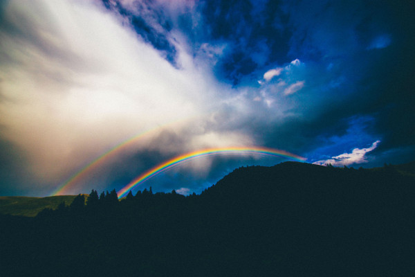 Double rainbow over mountains