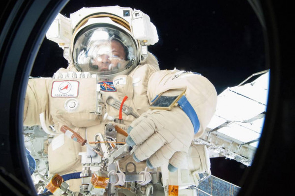 An astronaut on a spacewalk