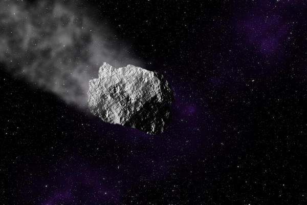 An asteroid flying through space