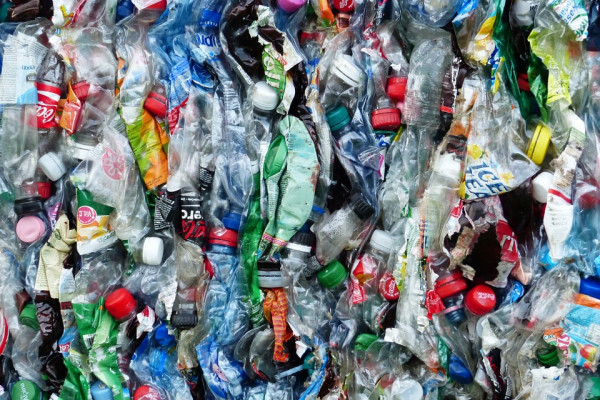 A large block of crushed plastic drinks bottles