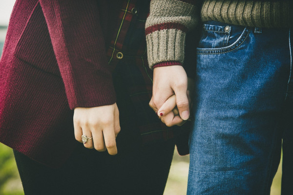 Couple holding hands