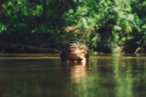 Swimmer in river water.