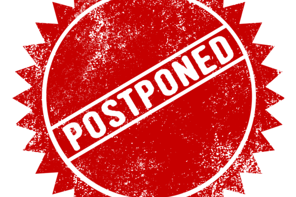 A sign that says postponed