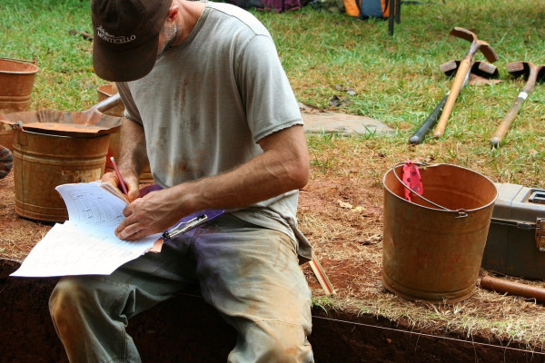 An archaeologist at a dig site