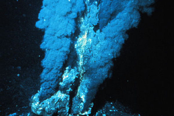 A Black smoker - a deep sea hydrothermal vent releasing mineral-rich super-heated water. Vents like these support a host of extreme lifeforms (extremophiles).