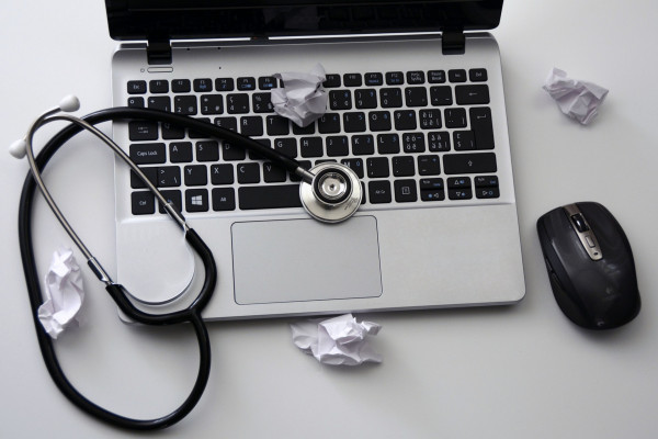 Laptop and stethoscope