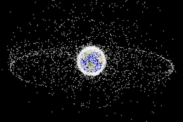 Image representing the amount of space junk around the earth: dots are not to scale. 