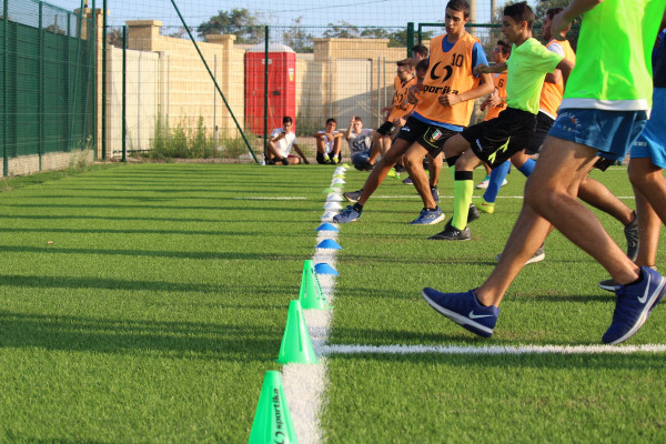 Young people taking part in track and fitness training