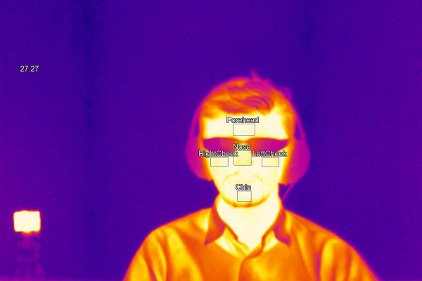 Thermal camera image of a person wearing glasses. 